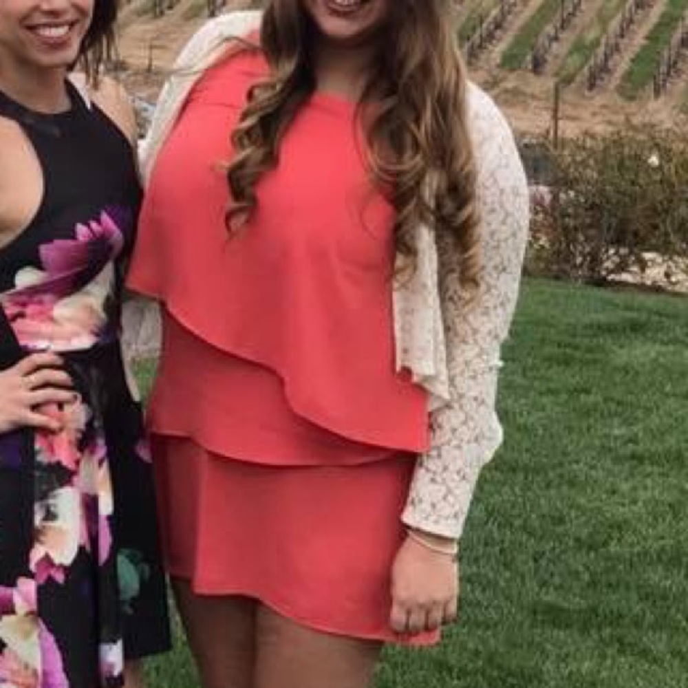 Coral sleeveless tiered ruffle dress